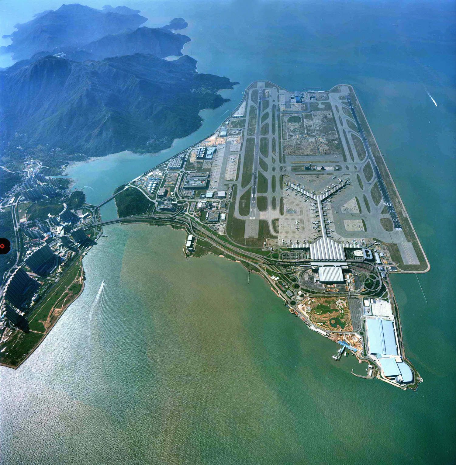 Aerial view of Hong Kong Airport, for which DAN-doors has supplied many Hifg Speed doors