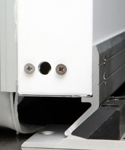 Swing door in MENY supermarket with frosted Polycarbonate and kick plates